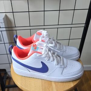 Nike - White and Blue Sneakers with Orange Accents